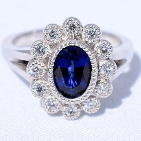 floral sapphire halo engagement ring