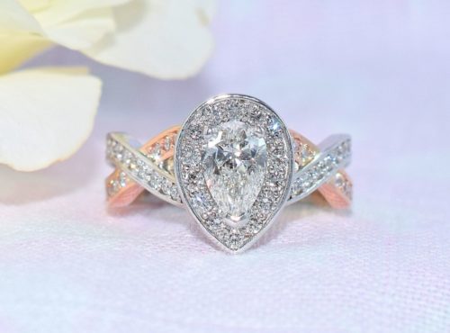 pear diamond halo engagement ring