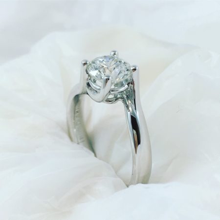 solitaire engagement ring with white background