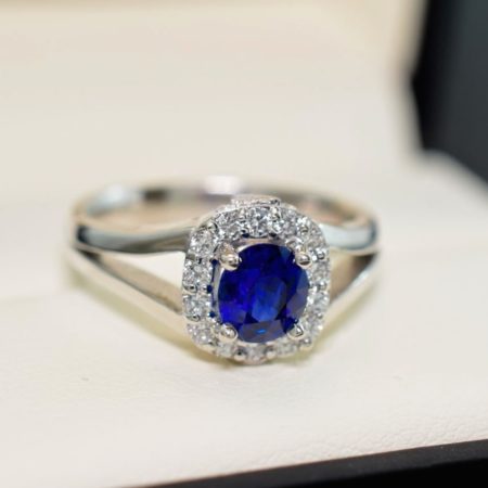blue sapphire halo diamond ring