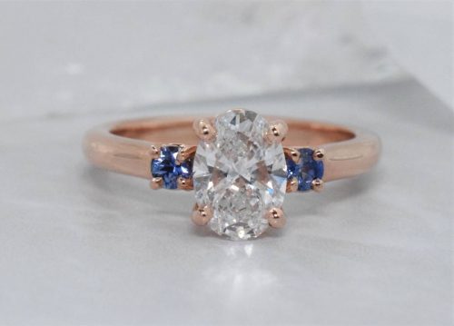 oval three stone engagement ring