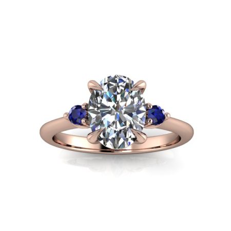 1.25 ct approx oval three stone engagement ring with sapphires in rose gold