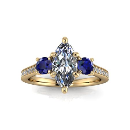 75 ct approx three stone ring with sapphires in yellow gold
