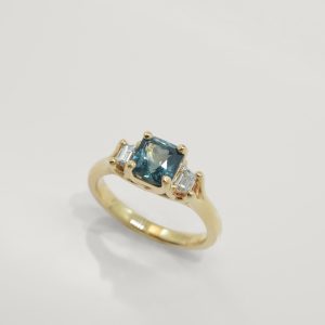 Teal Radiant Three Stone Ring